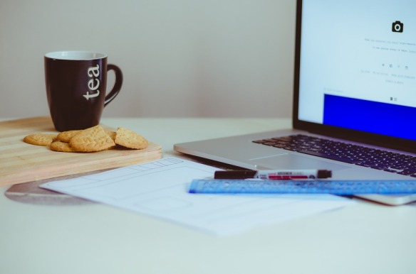 tea and cookie on desk